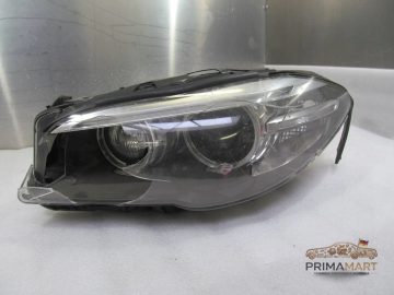 Foto 2 von Frontscheinwerfer BMW 7424151 Links