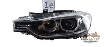 Foto 1 von Frontscheinwerfer BMW Xenon 7338701 Links