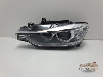 Foto 2 von Frontscheinwerfer BMW Bi-Xenon 7338701 Links
