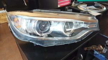 Foto 2 von Frontscheinwerfer BMW 7410786 Rechts