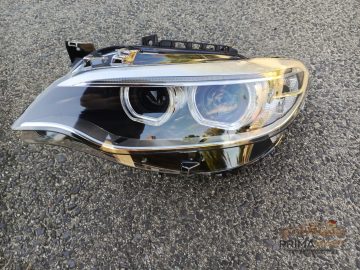 Foto 2 von Frontscheinwerfer BMW 7304465 Links