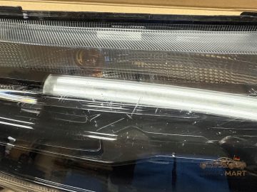 Foto 2 von Frontscheinwerfer 266008993R Rechts
