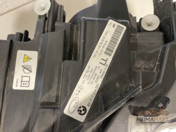 Foto 4 von Frontscheinwerfer BMW 7314531 Links