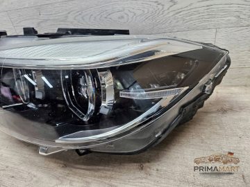 Foto 4 von Frontscheinwerfer BMW 7498925 Links