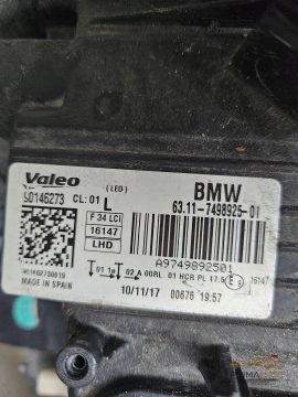 Foto 11 von Frontscheinwerfer BMW 7498925 Links