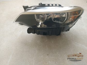 Foto 2 von Frontscheinwerfer BMW 7304461 Links
