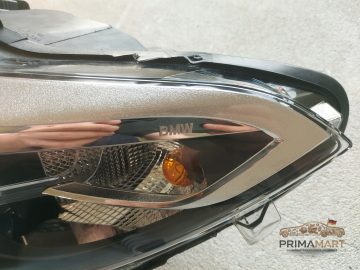 Foto 4 von Frontscheinwerfer BMW 7304461 Links