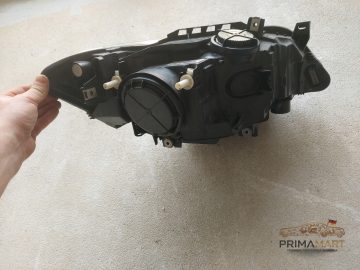 Foto 10 von Frontscheinwerfer BMW 7304461 Links