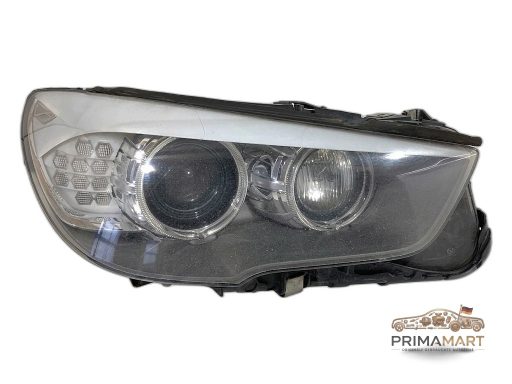 Frontscheinwerfer BMW 7199614 Links