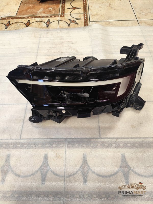 Frontscheinwerfer Opel 9834008280 Links