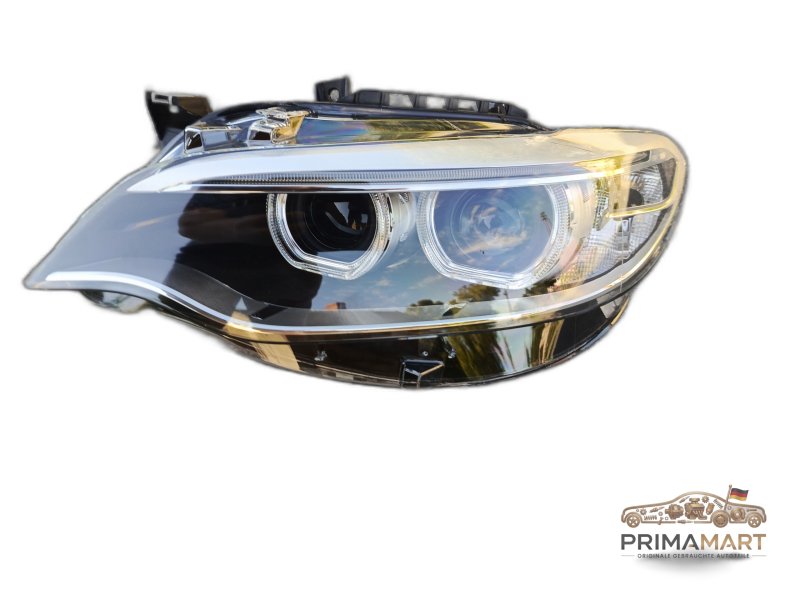 Frontscheinwerfer BMW 7304465 Links
