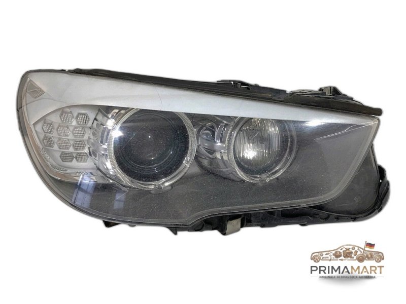 Frontscheinwerfer BMW 7199614 Links